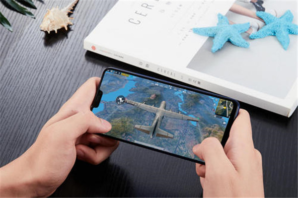 荣耀play玩游戏耗电快吗