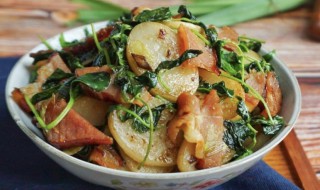 草头炒年糕制作方法(草头炒年糕怎么做)