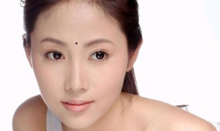 女人巨富痣长在哪里的（女人巨富痣长在哪里的图片大全）